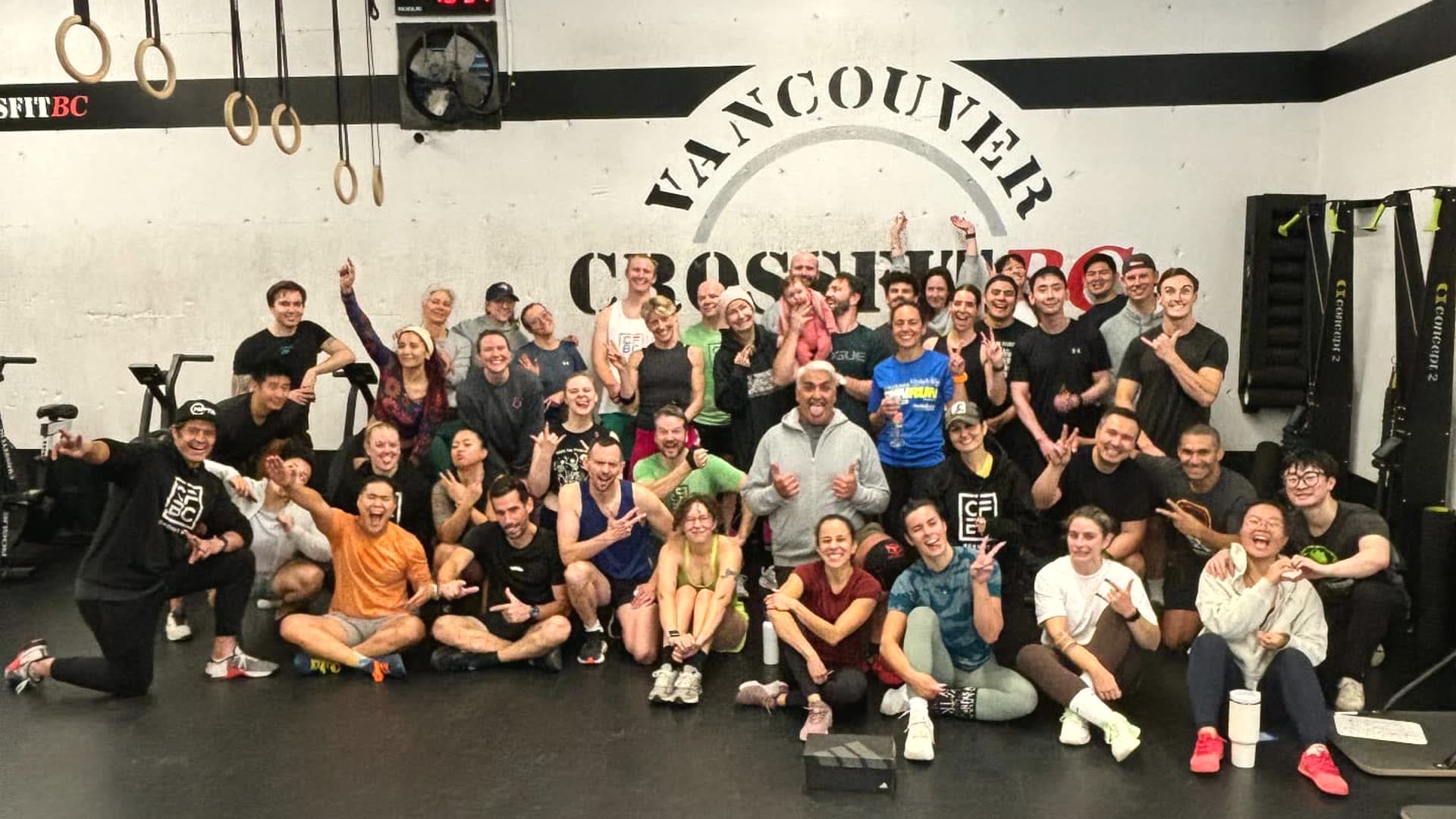 CrossFit BC community in Olympic Village Vancouver – members and coaches together after class