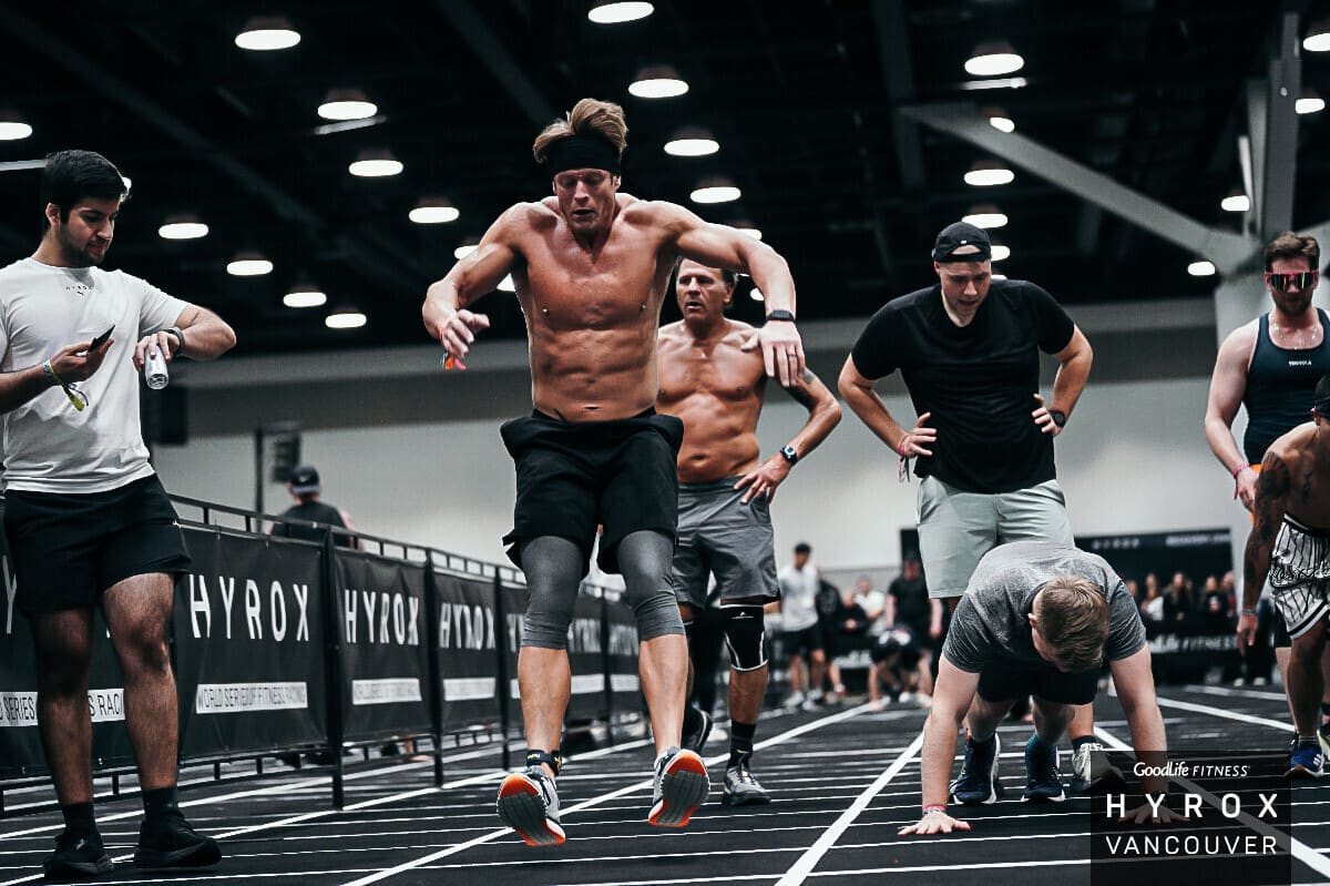 Athlete performing burpee broad jumps during HYROX training at CrossFit BC