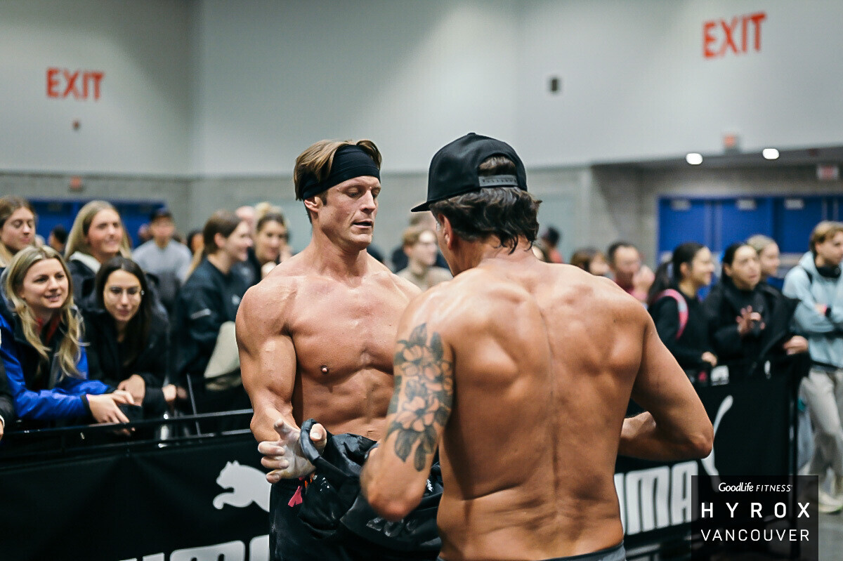 Post-race handshake between HYROX athletes