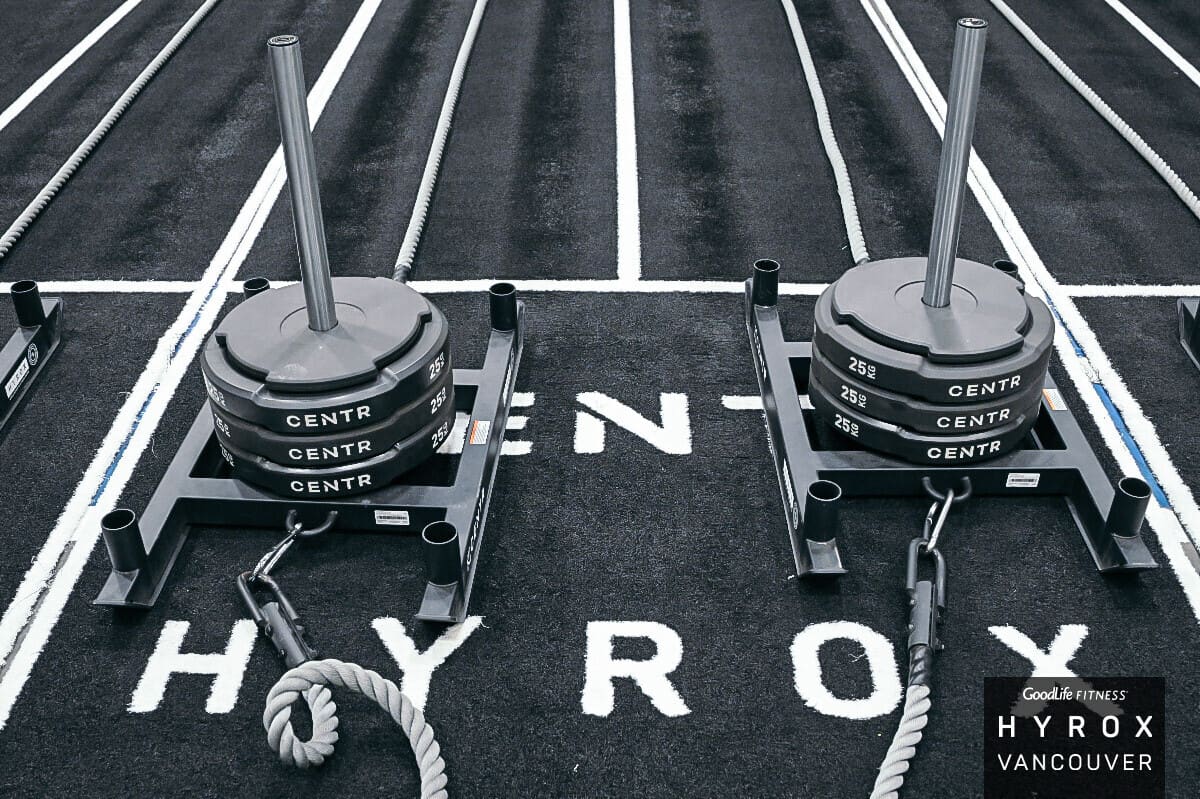 Sled stations during a HYROX race simulation at CrossFit BC