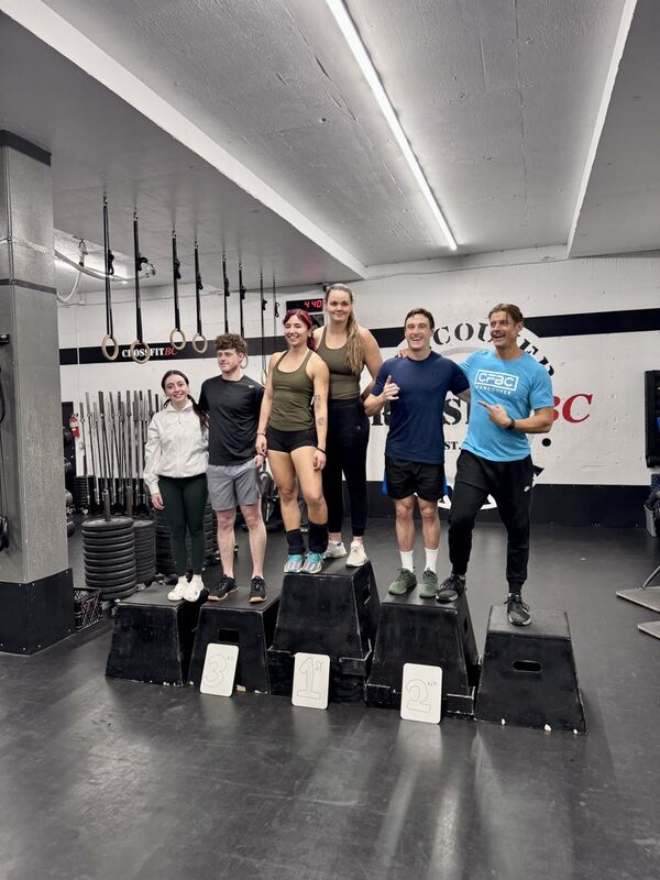 CrossFit BC members celebrating together at an in-house competition