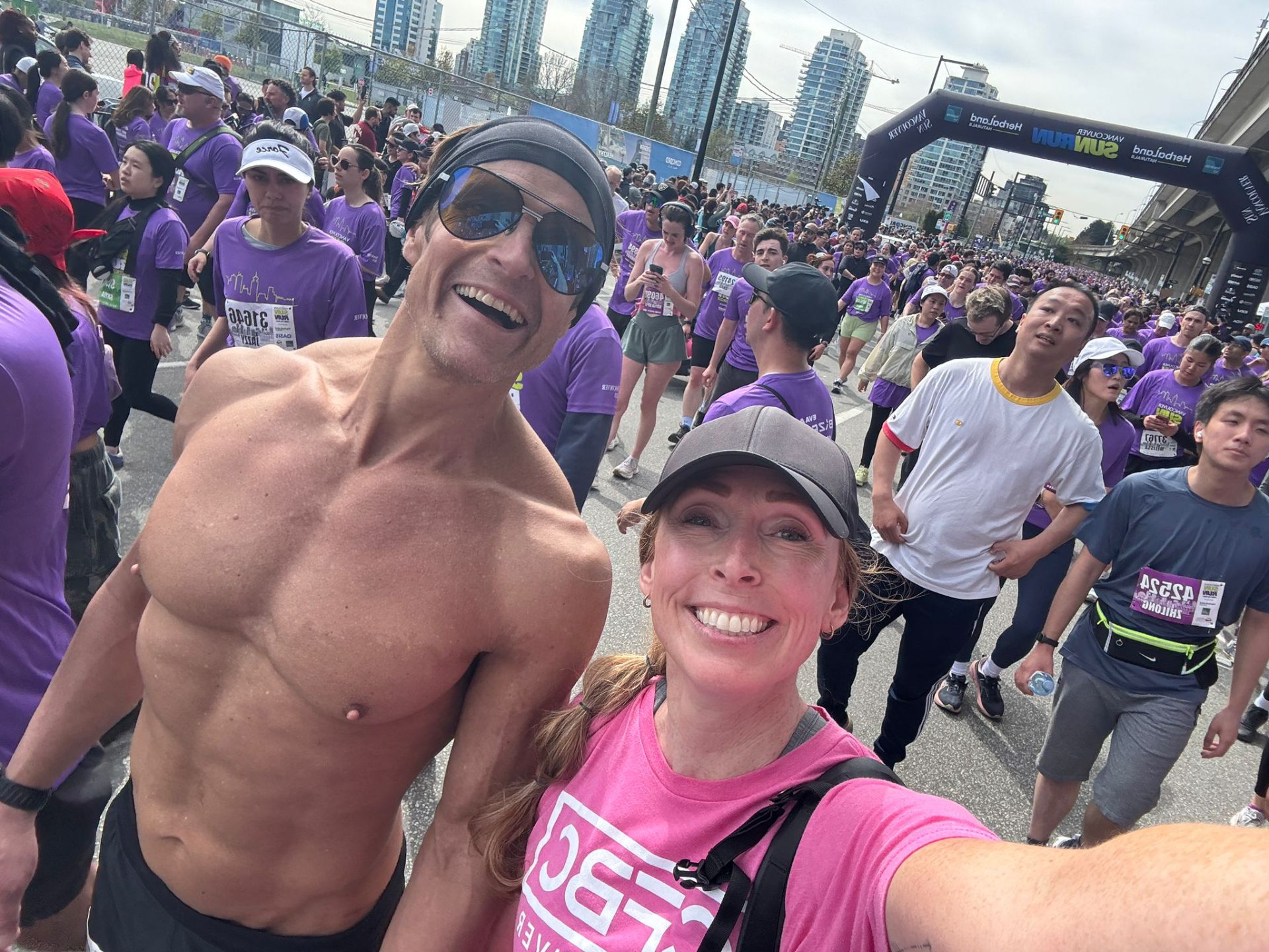 CrossFit BC runners cheering at the Vancouver Sun Run start line